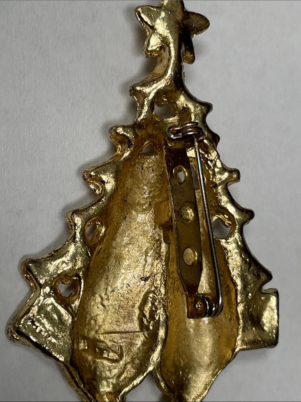unmarked gold tone
